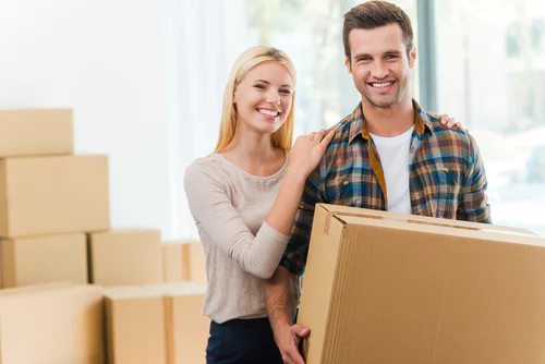 Couple holding a box