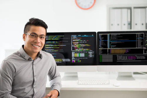 VMware user sitting in front of his work station